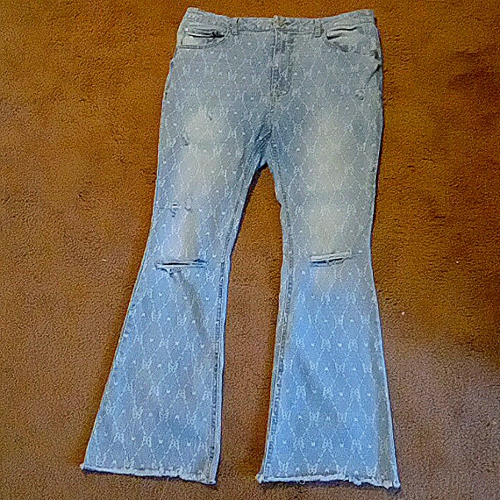 Ripped butterfly flare jeans